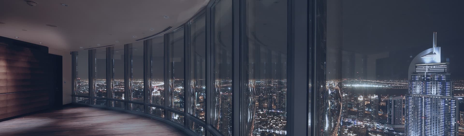 Interior of a Milos property overlooking the Dubai skyline